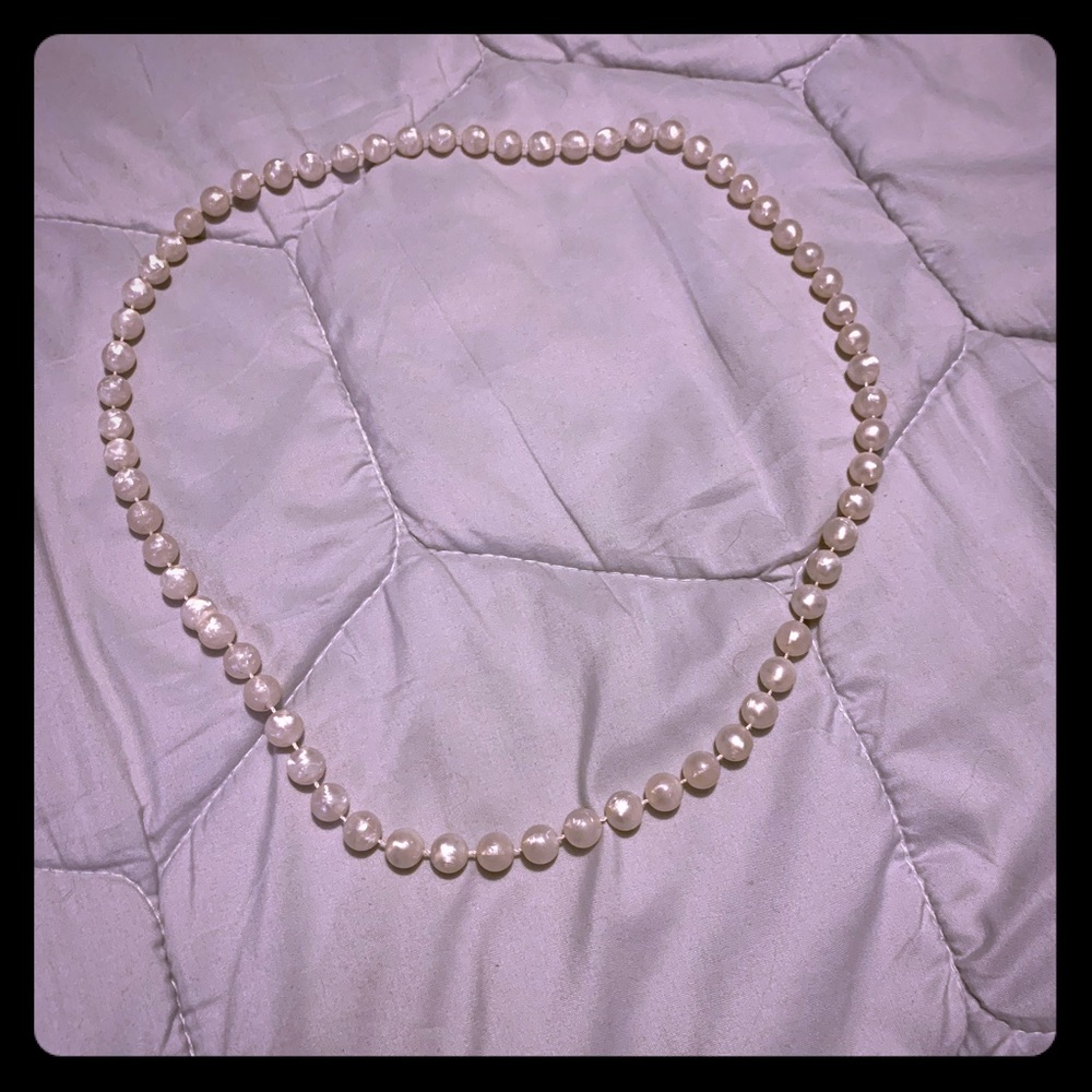 Plastic pearl necklace